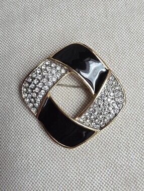 Classic Rhinestone And Black Enamel Brooch - Marked